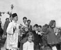 Jan Bula in procession with children